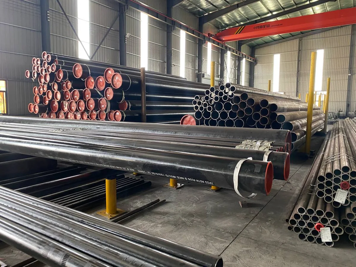 Carbon steel pipes with protected ends staged in the factory warehouse